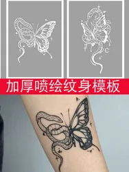 Thickened spray painted tattoo with hollowed out snake butterfly template with large flower arm