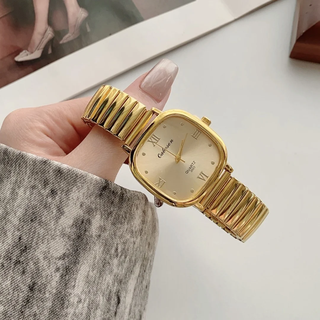 Reloj de cuarzo con puntero redondo dorado, reloj de pulsera clásico con banda elástica de simulación, adecuado para parejas masculinas y femeninas