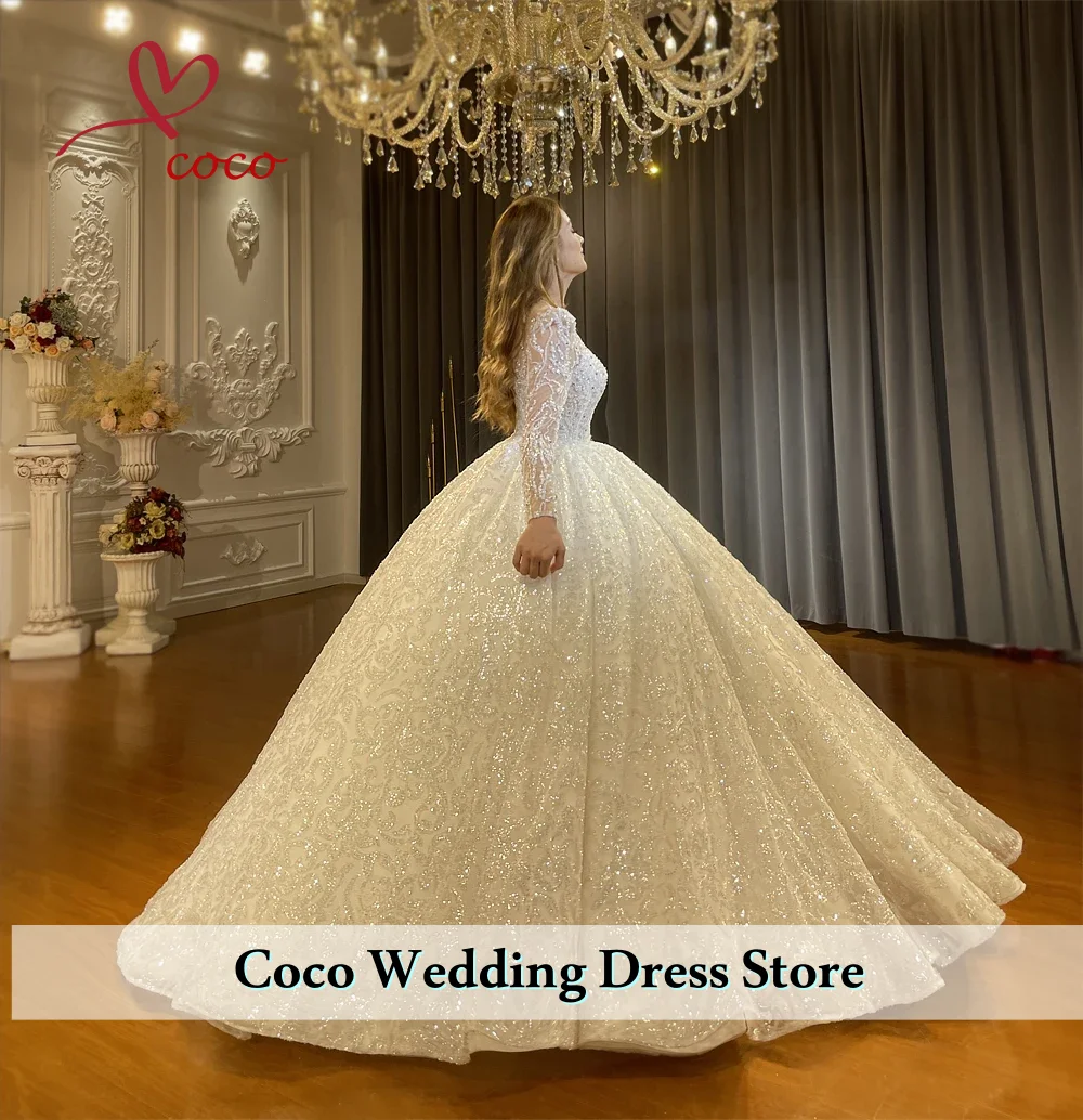 فساتين زفاف الأميرة الرائعة المطرزة باللؤلؤ بأكمام طويلة من الدانتيل اللامع فساتين زفاف فيستدوس دي نوفيا