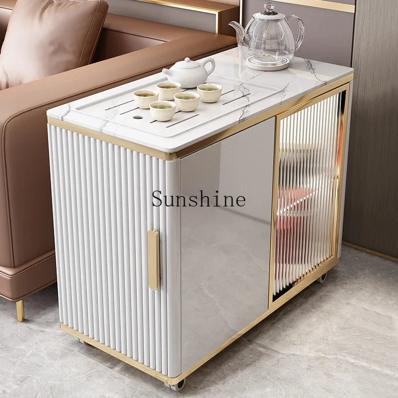 

A few white mobile tea tables next to the sofa, Kung Fu tea table, kettle integrated FT