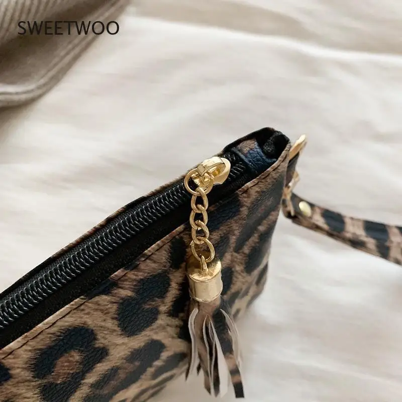 Borsa da polso geometrica con stampa di mucca leopardata in pelle PU borsa portaoggetti per telefono cellulare con moneta pochette da pranzo da donna