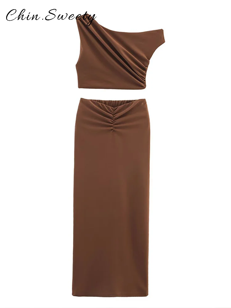 أطقم تنورة طويلة مثيرة للسيدات ذات ياقة مائلة متينة قطع علوية قصيرة غير متماثلة بخصر منخفض تنانير مستقيمة لصيف 2025 ملابس للإجازات للسيدات