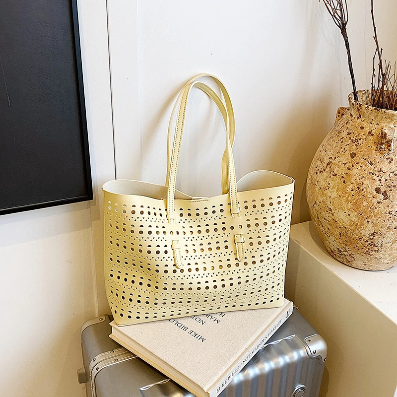 

2025 полые стильные дизайнерские сумки на плечо из искусственной кожи, однотонные, высококачественные, роскошные, изысканные дизайнерские стильные сумки-тоут для женщин