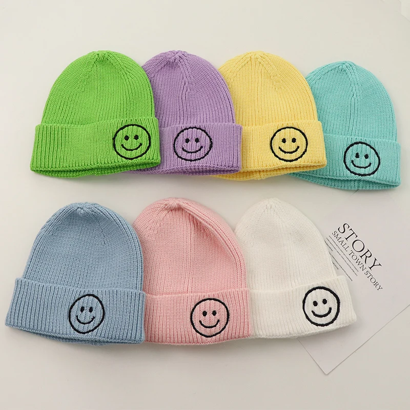 Children autumn winter new knitted wool hat Korean plate embroidery smiling face pullover hat candy colored boys and girls hats