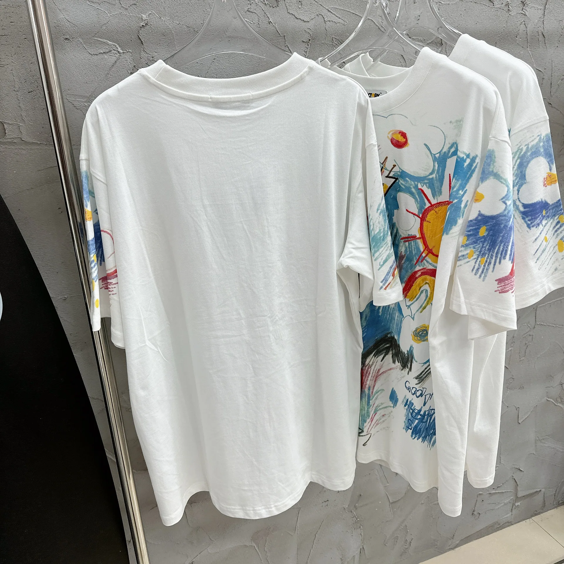 

High quality 2024 summer new casual and fashionable loose and playful hand drawn graffiti printed embroidered cotton T-shirt