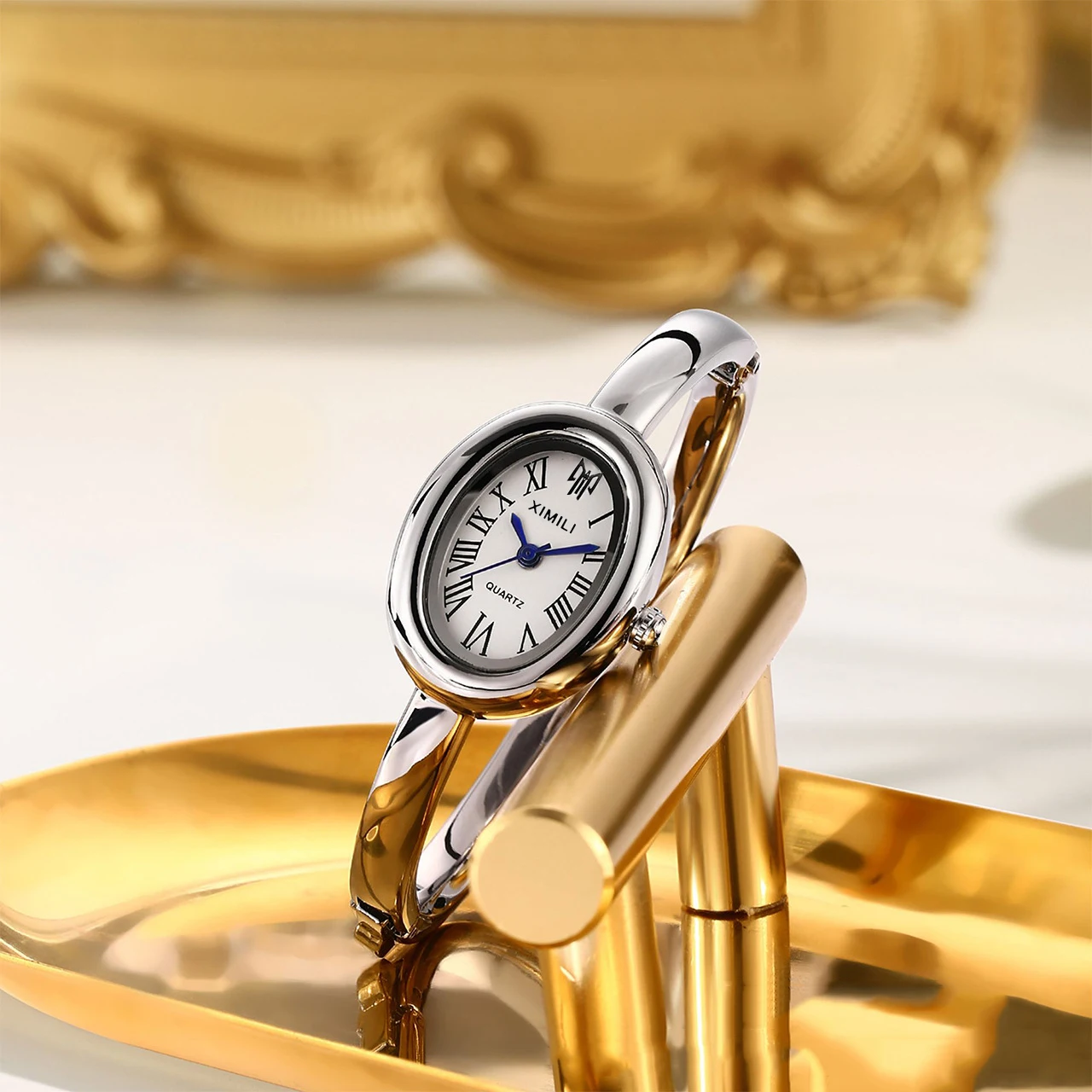 นาฬิกาข้อมือผู้หญิง ดีไซน์หรูหรา สายสแตนเลส แบรนด์ดัง หน้าปัดทรงรีเล็ก ตัวเลขโรมัน ระบบควอตซ์
