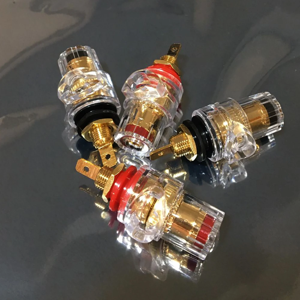 محطة ربط مكبر الصوت المطلية بالذهب مع غلاف شفاف لموصل قابس الموز