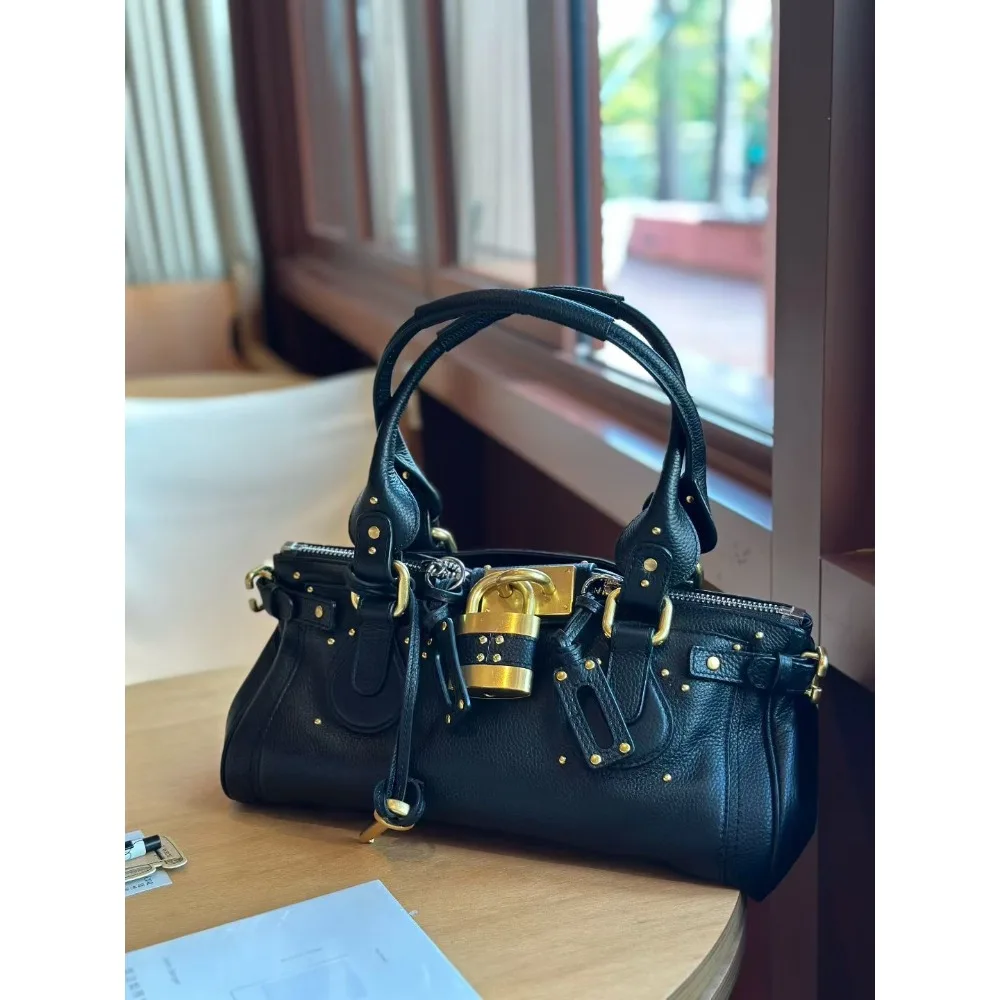 Nicho de cuero de primera calidad, estilo Medieval clásico, nicho Retro, moda versátil, bolso con cerradura antigua, bolso de hombro portátil para axila, tendencia genial