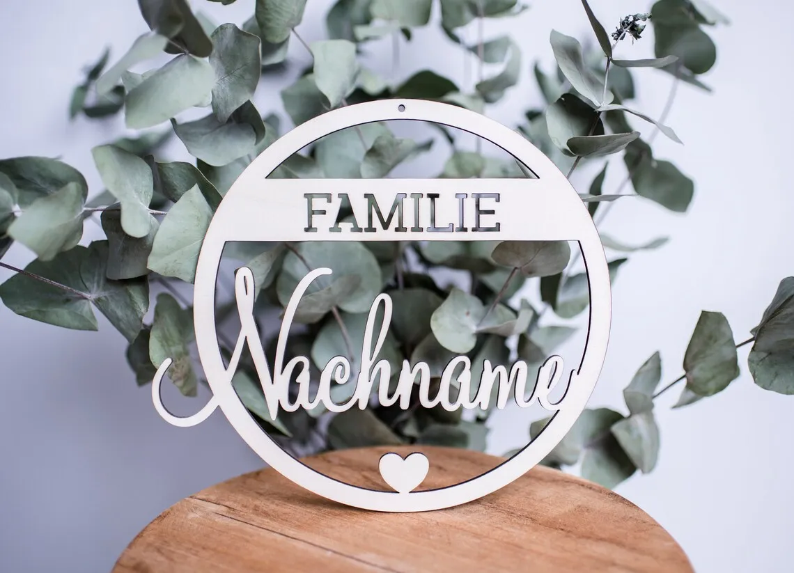 

Personalized family sign made of wood with a heart, wooden name sign, family door sign, gift idea for moving in