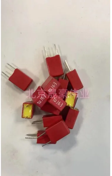 

5pcs German 63V1UF 105 fever audio coupling film capacitor audio capacitor red copper feet capacity 1UFf 105