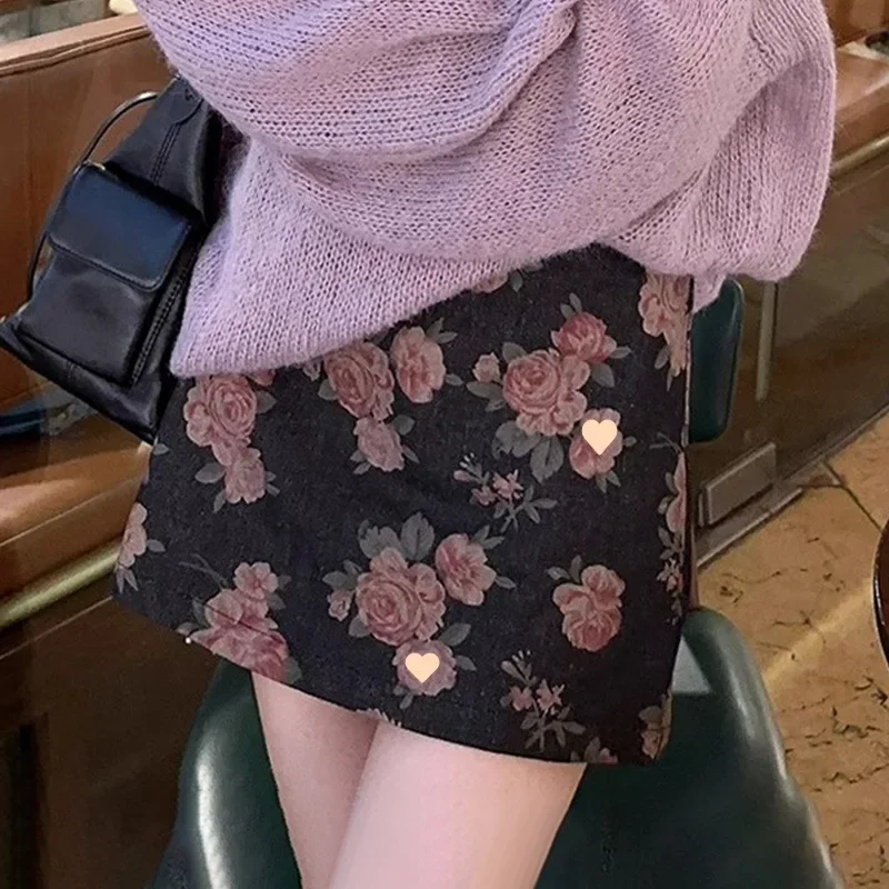 Korean retro rose skirt female autumn and winter new fashion atmosphere temperament Joker high waist floral slim skirt.