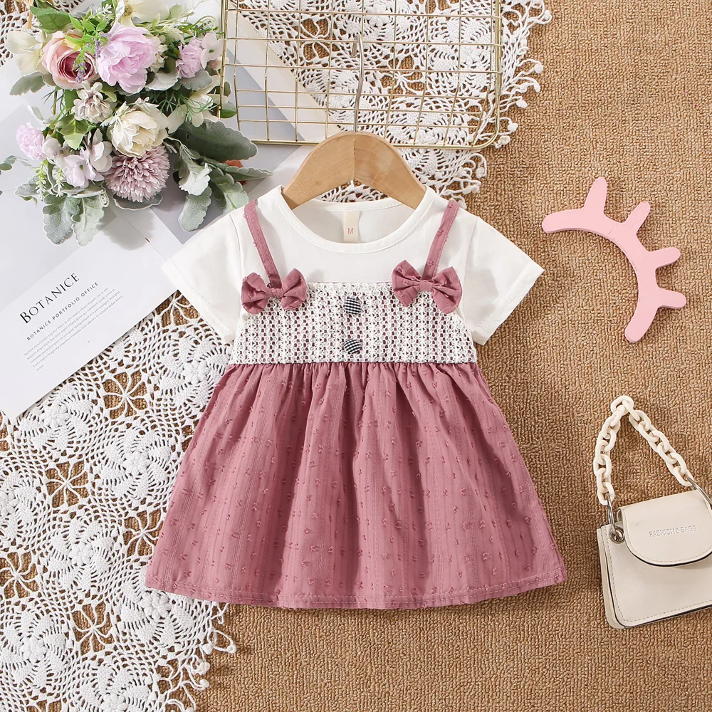 Summer baby girl dress baby girl fake two pieces of pure white short sleeved two small bow strap dress