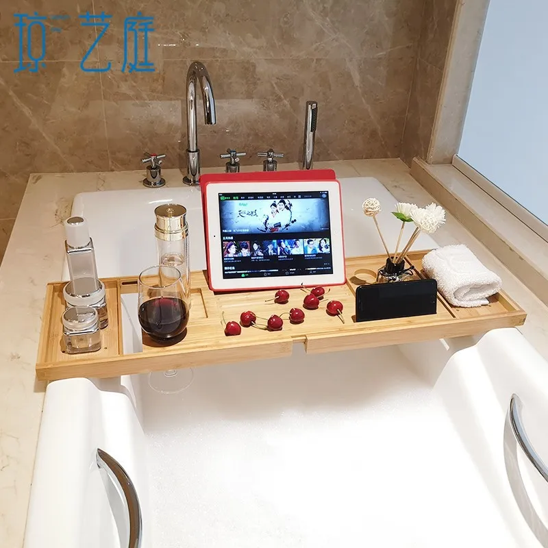 Extendable bathtub tray/shelf for holding mobile phones, tablets, books, and bath supplies while bathing.