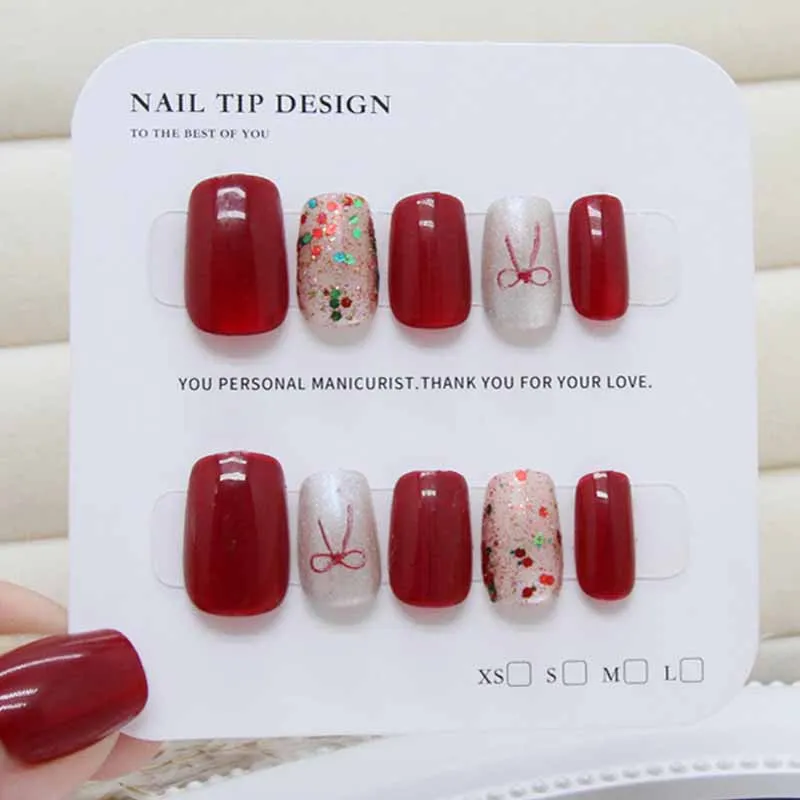 10-teiliges Damen-Nagelaugen mit roten Katzenaugen, handgefertigt, zum Aufdrücken der Nägel, rote Schleife, bunt und funkelnd, europäischer und amerikanischer Stil, Nagelflicken, Nagelkunst