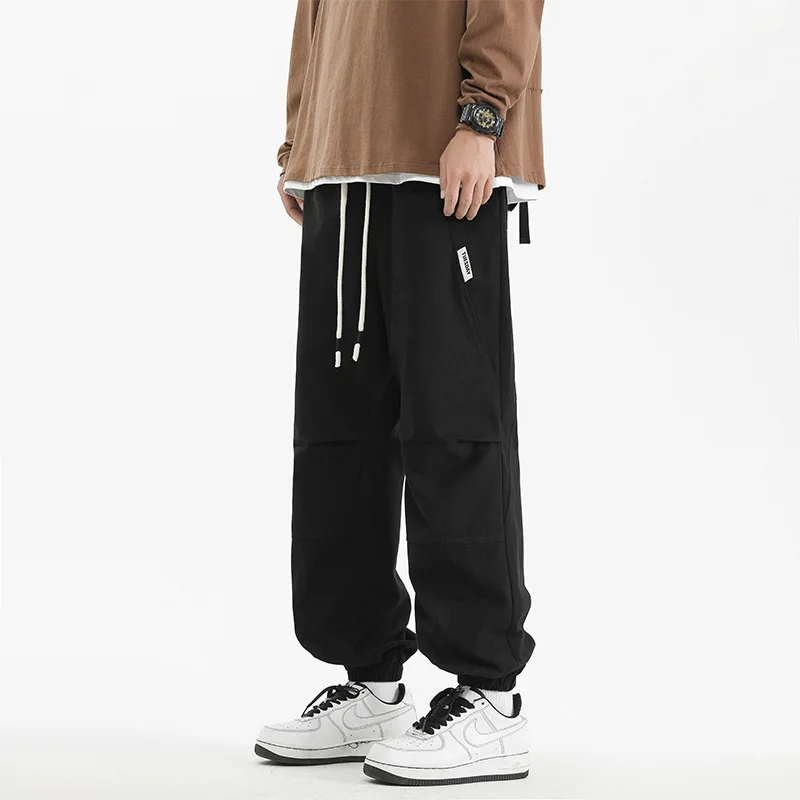 سراويل غير رسمية للرجال مكونة من 9 نقاط ، سراويل الركض الجديدة للربيع والخريف من القطن الخالص لعام 2025 ، سراويل عمل Harun الرياضية فضفاضة والكاحل