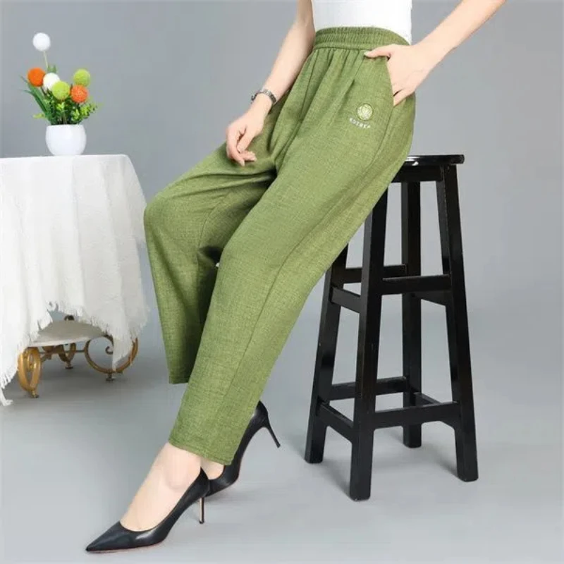 2024 Summer Women's Casual Fashion Elegant Commuting Loose Versatile Pocket High Waist Elastic Band Nine Point Harlan Pants