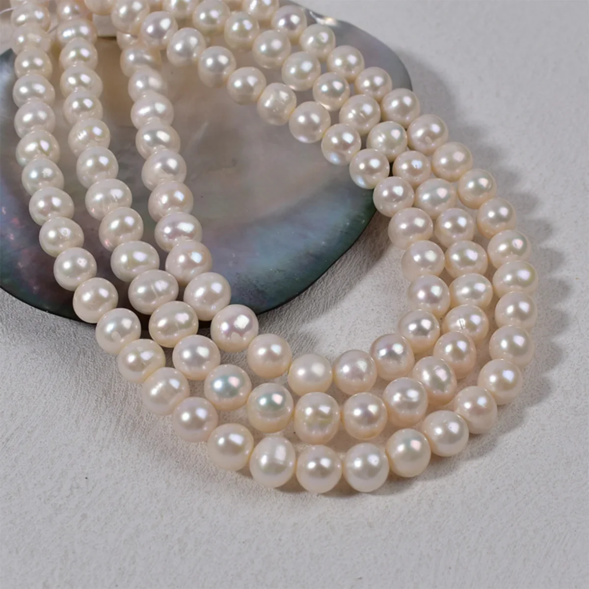 9-10mm Real Pearl High Quality Non Nuclear Natural Freshwater Pearls with Strong Light and Few Lines, Egg Shape 40cm/string