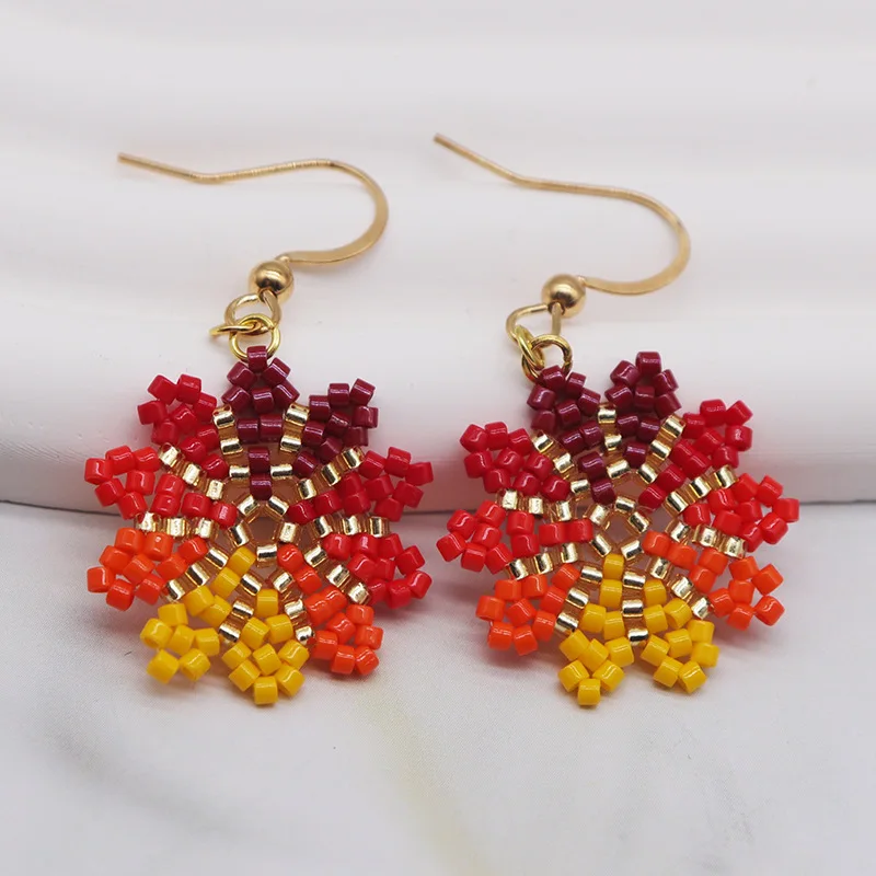 Beaded earrings Snowflake Hollow out Originality Colour Design Geometry Hand knitting Bohemia Tide Simple Rice bead earrings