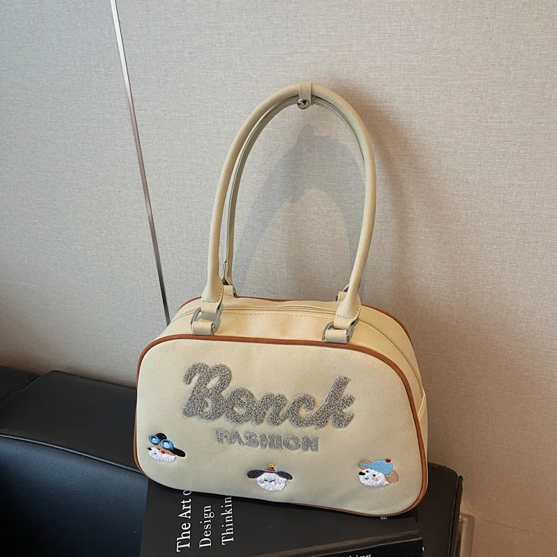 Hot-selling Korean version of cartoon cute embroidered handbag fashionable texture large capacity portable going out women's bag