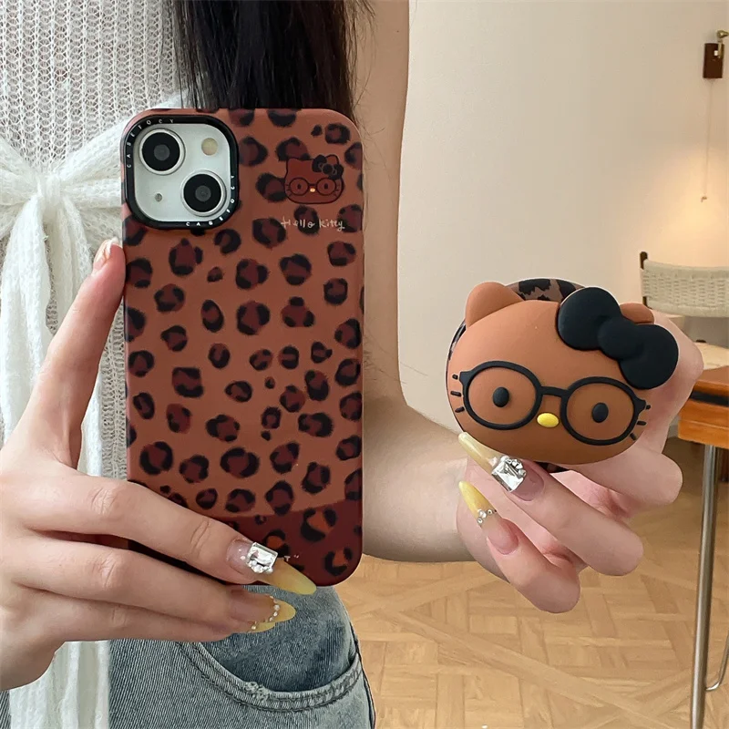 

Fashion Brown Leopard Print Magnetic Phone Case For iPhone 17 Pro 16 15 Pro 14 Cover with Hello Kitty Stand For Magsafe Cases