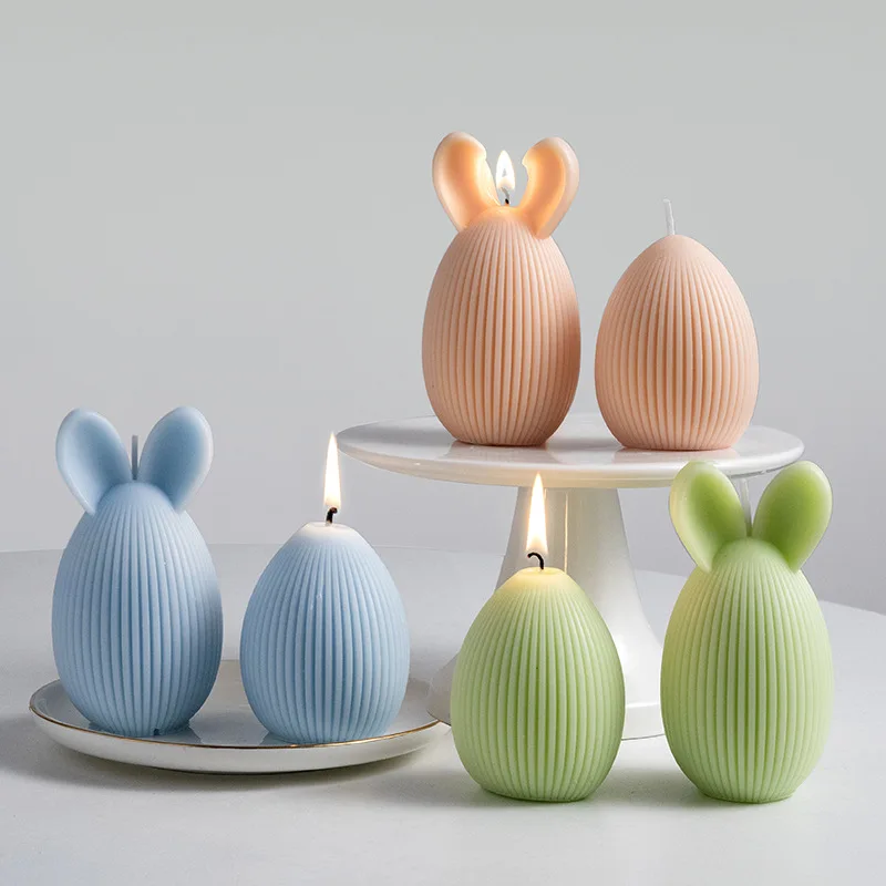 Easter eggs, mini rabbit shaped aromatherapy candles, creative festive atmosphere decoration
