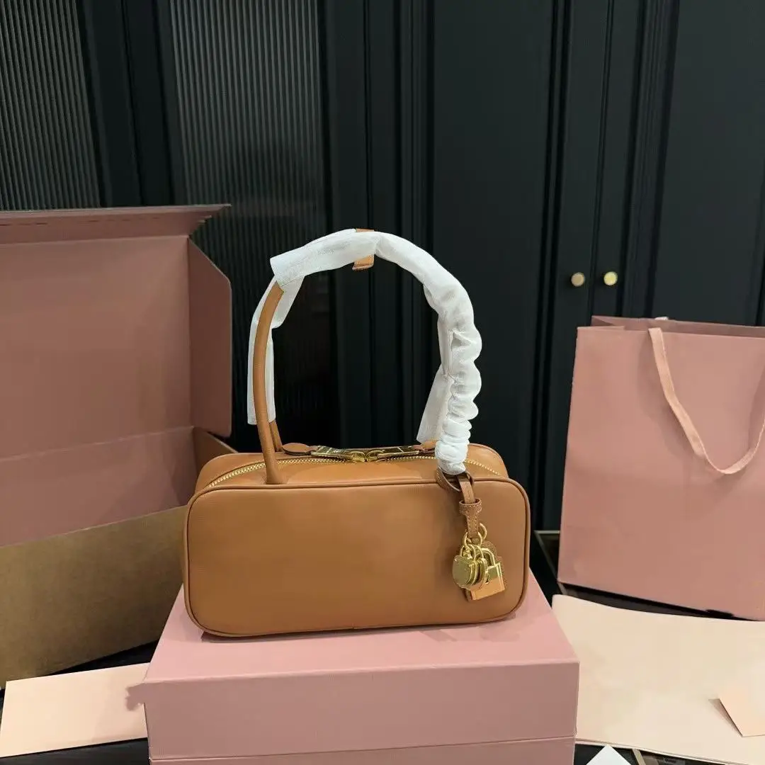 

Real leather long handle Women's bag 2025 Boston bowling bag retro commuter sense baguette bag one shoulder underarm Female bag