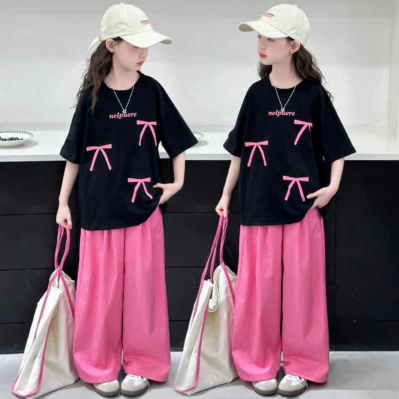 Venda quente crianças verão superior e inferior 2 peças conjunto de roupas com arco para meninas elegante algodão camiseta calças agasalho para crianças