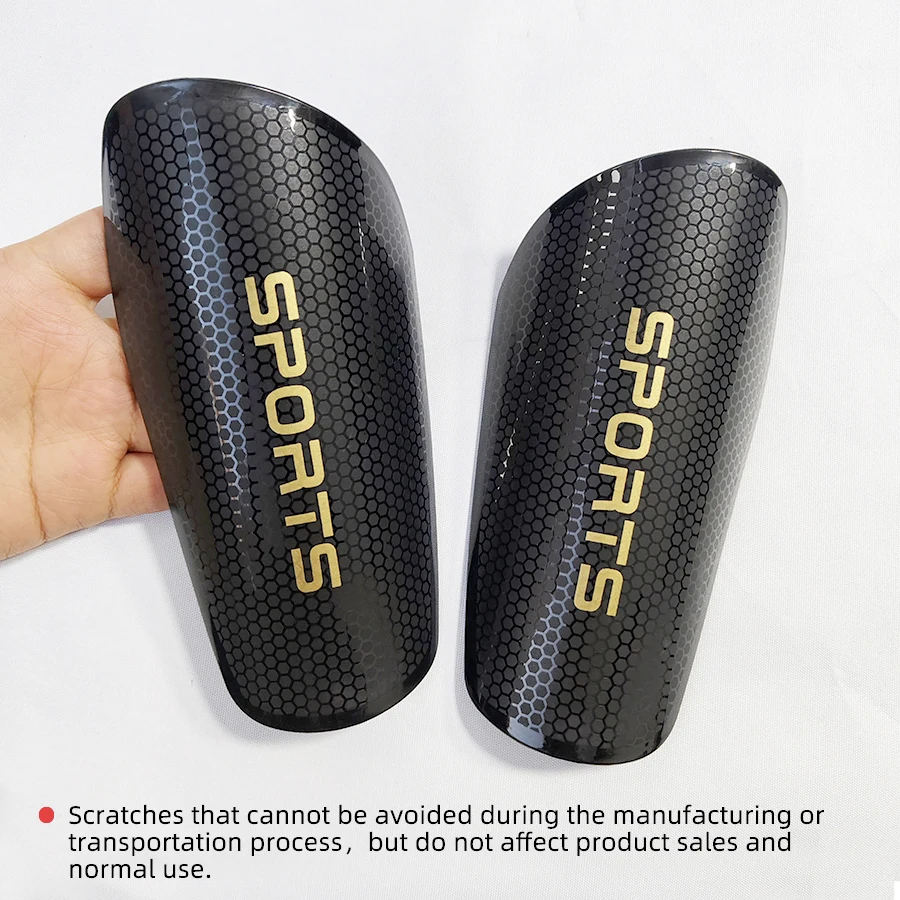 Une paire de protège-tibias de football pour jeux de football, déflecteurs anti-collision, protège-mollet épais