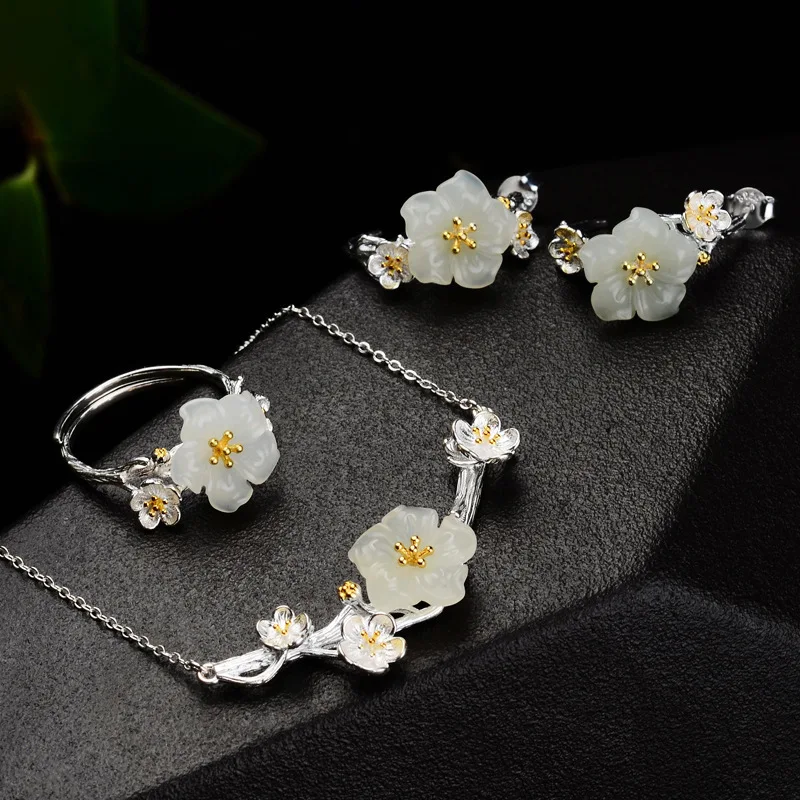 

Natural Hotan Jade plum blossom jewelry sets Elegant and luxurious ring earrings for women S925 silver wedding accessories