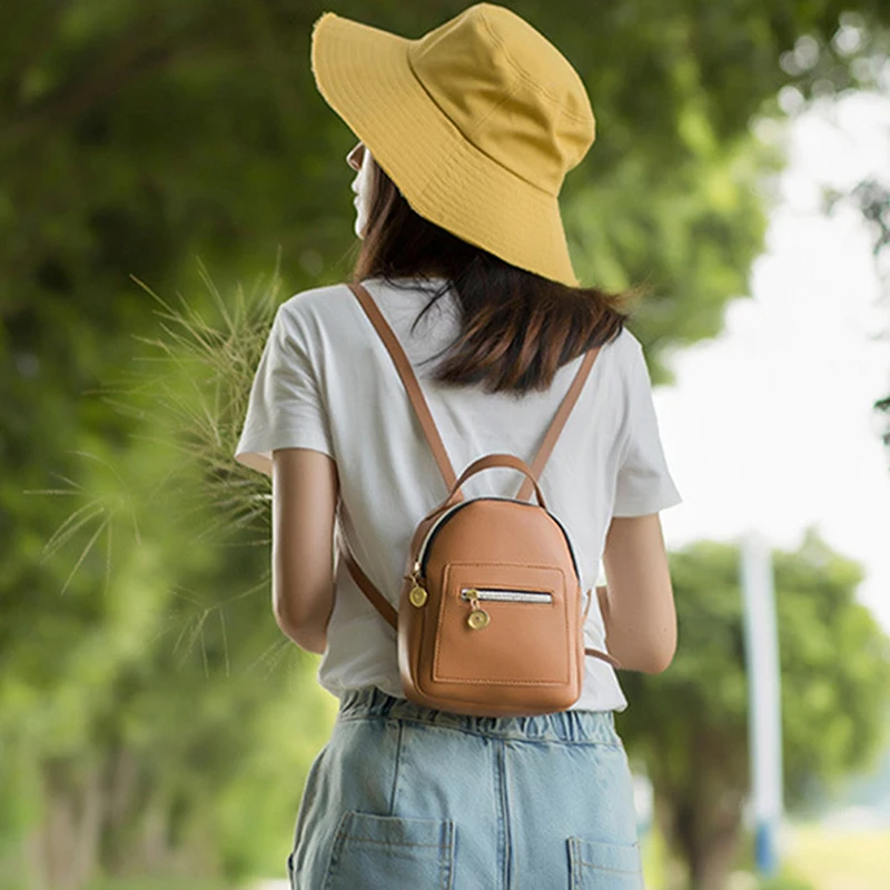 Mini mochila de couro macia para mulheres, bolsa de ombro pequena para senhoras, moda designer