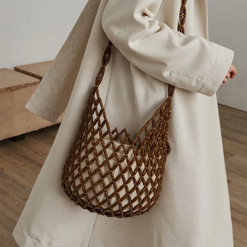 

2025 Summer New Fashionable and Versatile Ins Style Handmade Beaded Hollow Weaving Beach Bag