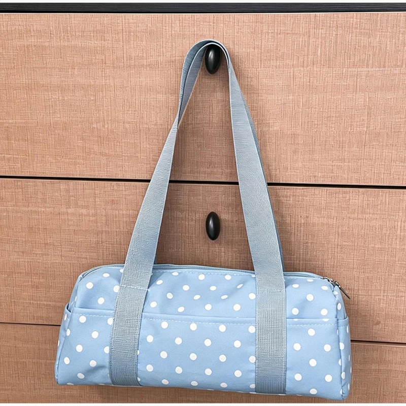 Gepunktete Schultertasche in langem Zylinderformat, Damen-Handtasche mit Tragegriff, zylindrische, leichte, schicke Tragetasche für den Arbeitsweg – Detail 20