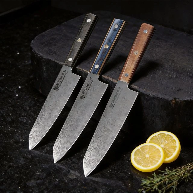 A set of 3 Japanese kitchen knives with Damascus steel laser engraved blades and wooden handles, perfect for sharp kitchen chefs