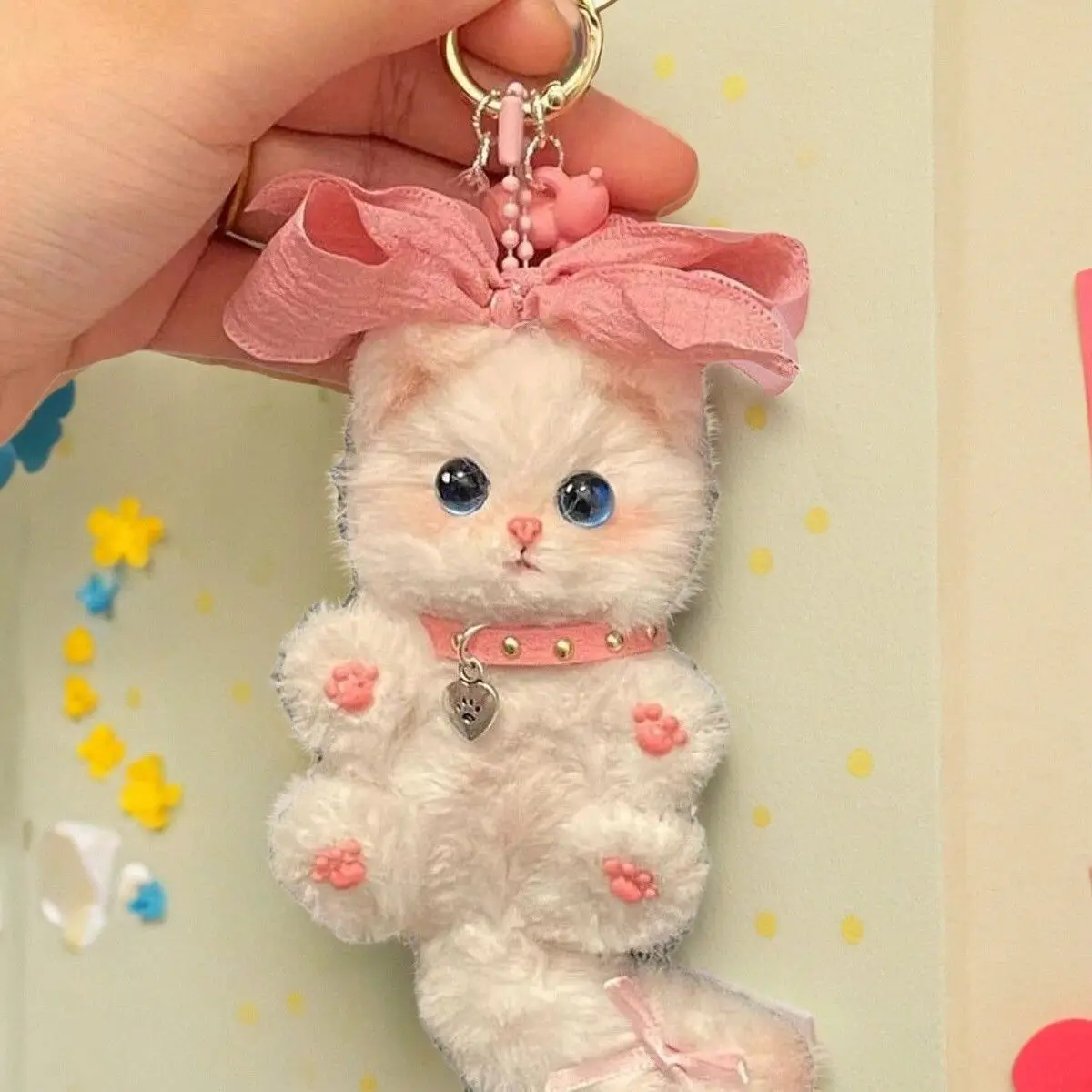 A cute diy material bag with a twisted stick and a little cat, a plush handcrafted finished product, is a gift bag and pendant f