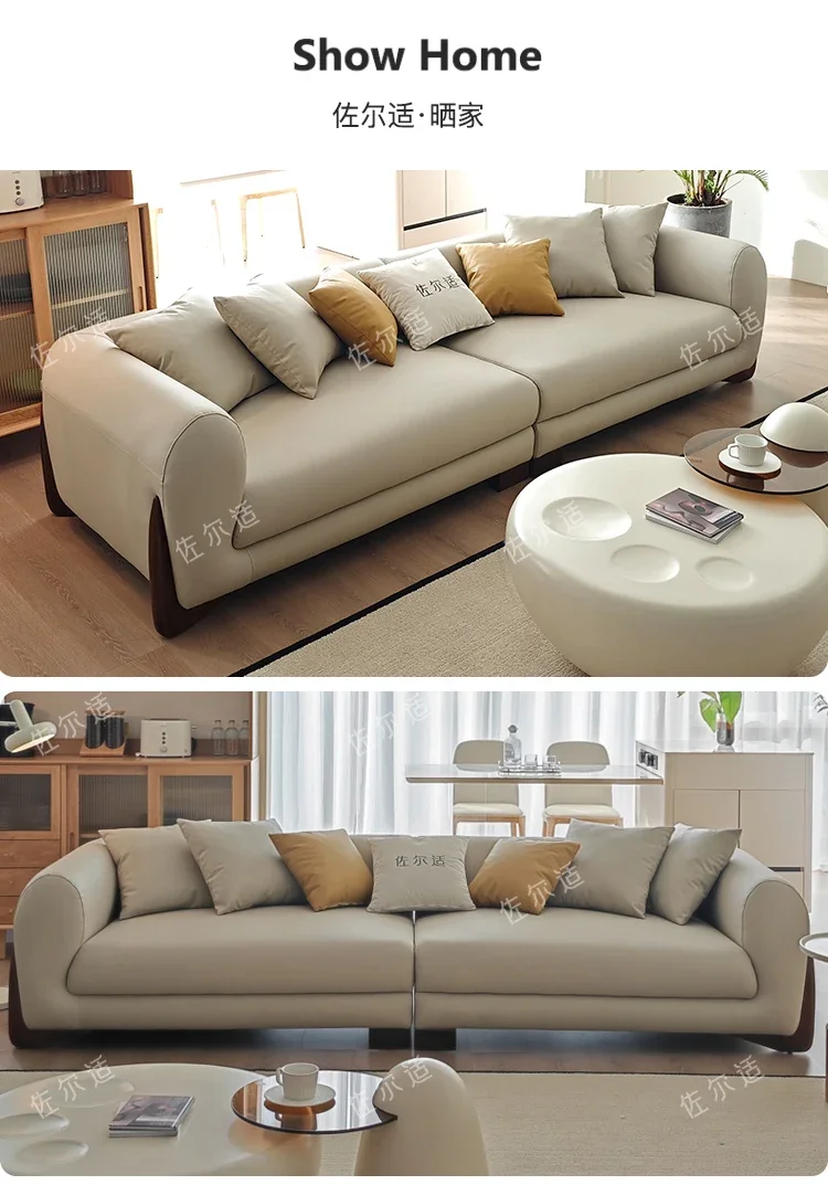 Modern minimalist small unit living room with straight down Italian style minimalist three person leather sofa