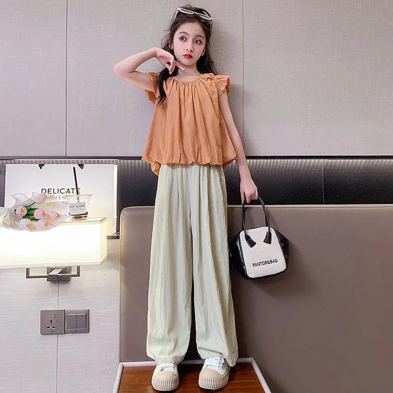 

Костюм детский летний из топа без рукавов и брюк, на возраст 6-10 лет