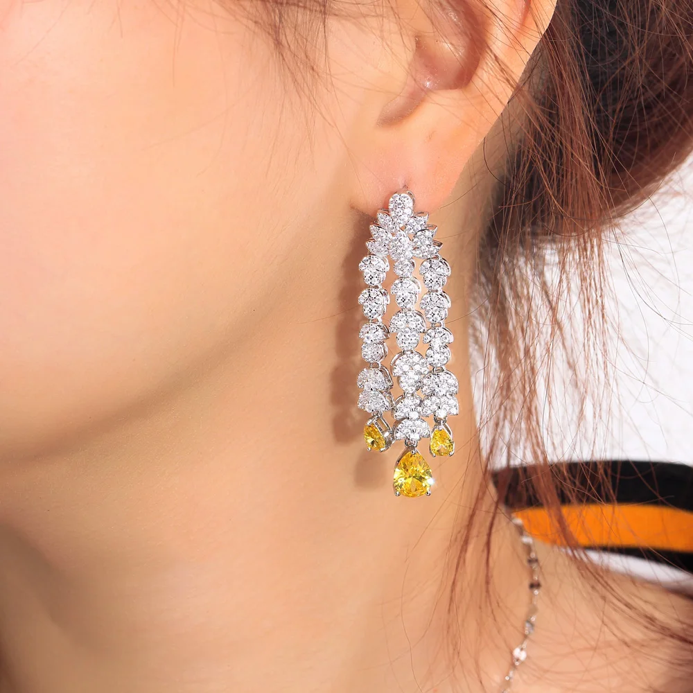 CWWZircons Glitzernde gelbe Wassertropfen-Zirkonsteine, lange, hängende, fransige Kronleuchter-Ohrringe für Damen, Hochzeit, Braut, Großhandel E0951 – Detail 1