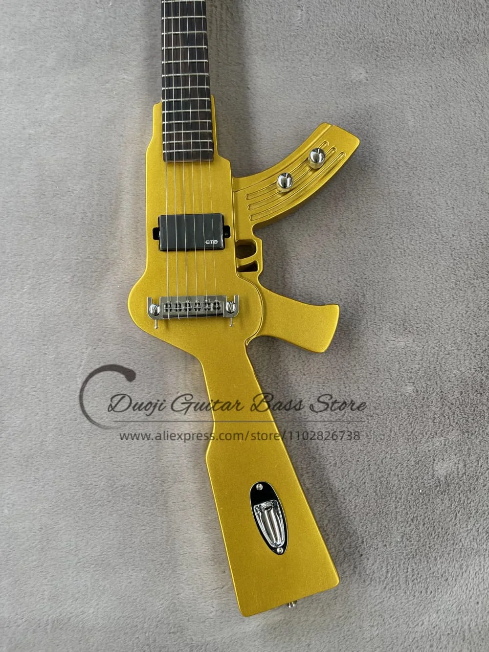 Golden guitar, fixed bridge, imitation AK gun shape, solid wood body with maple neck, chrome hardware, customizable