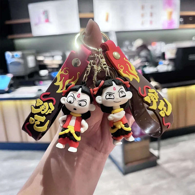 

Cartoon Nezha 2 key chain magic kid haunted the sea Kawaii schoolbag pendant car keychain small gift desktop decorations