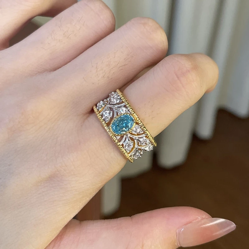 

BELLUX Italian Style Vintage Ring Woven Pattern Carved Gold Hollow Lace Artificial Sapphire 925 Silver Gold-plated Ring