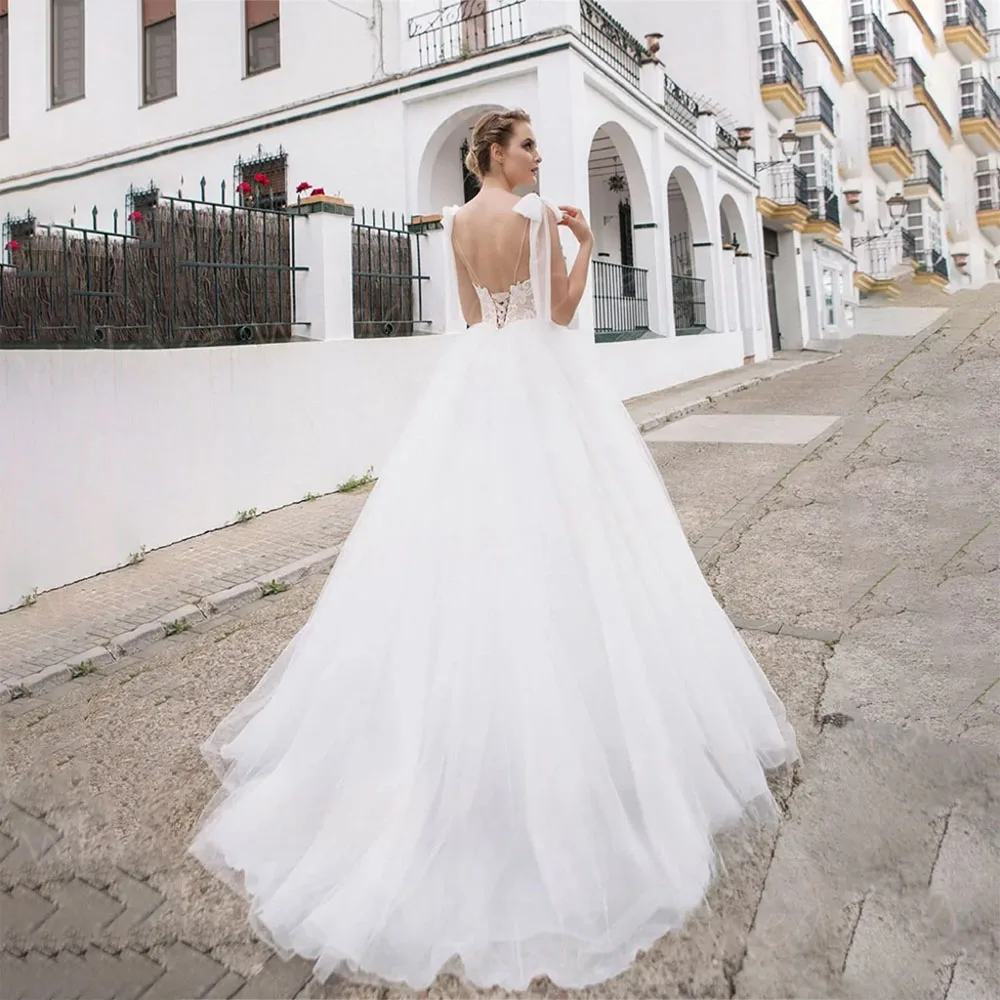 Fascynujące suknie ślubne A Line dla kobiet koronkowe aplikacje suknie panny młodej pełne wdzięku Sweetheart bez rękawów Backless Vestido De Novia