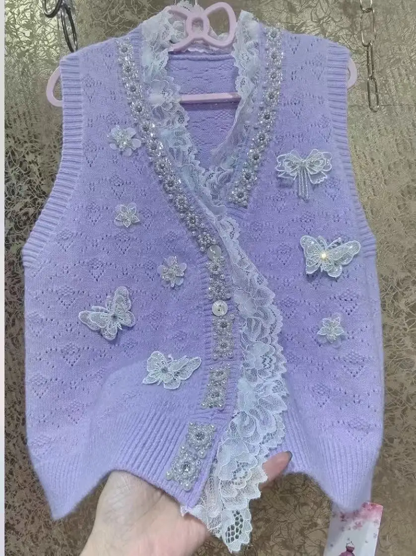 فاخر فريد تصميم المرأة تريكو سترة سترة صوف من دون أكمام اتجاهات 2025 الخريف محبوك ملابس امرأة