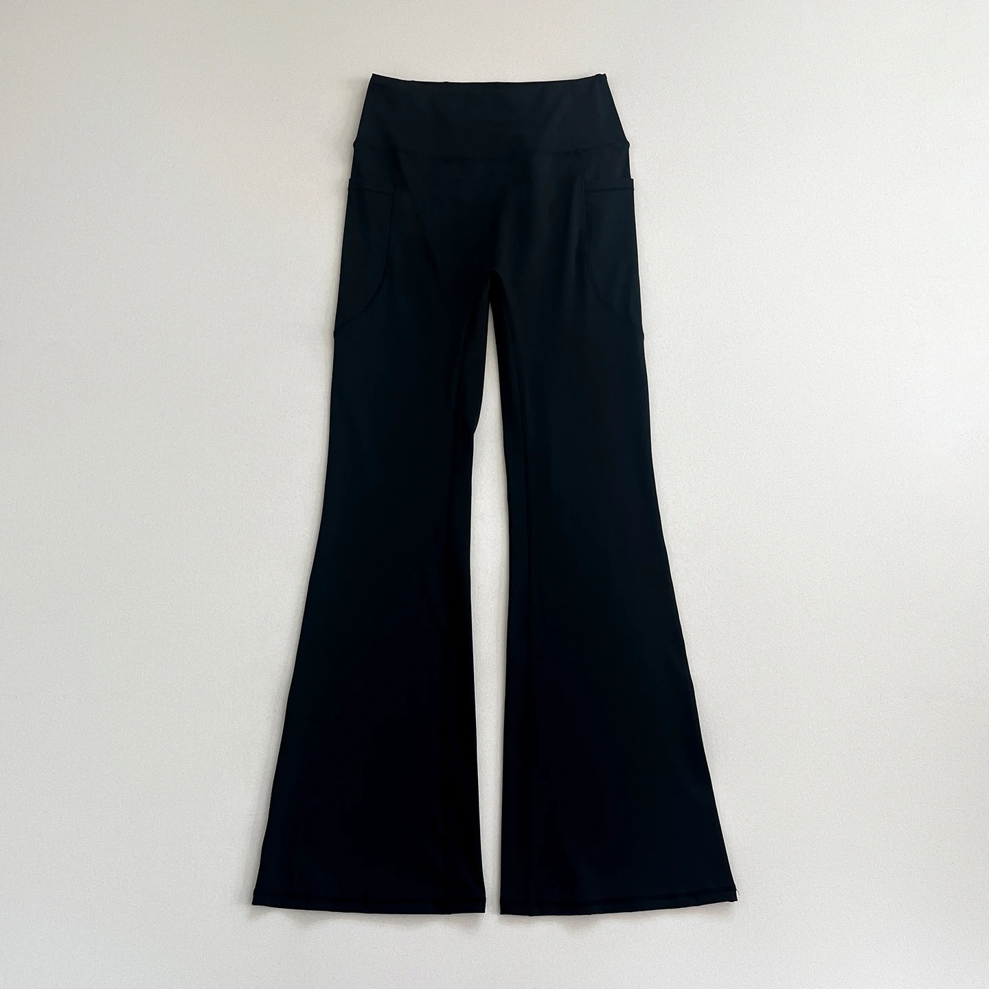 New High - Waisted Flare Yoga Pants, with side pockets, high - waisted and tummy - controlling, suitable for workouts.