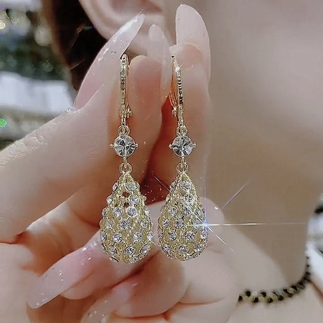 Golden colour long earrings hotsell