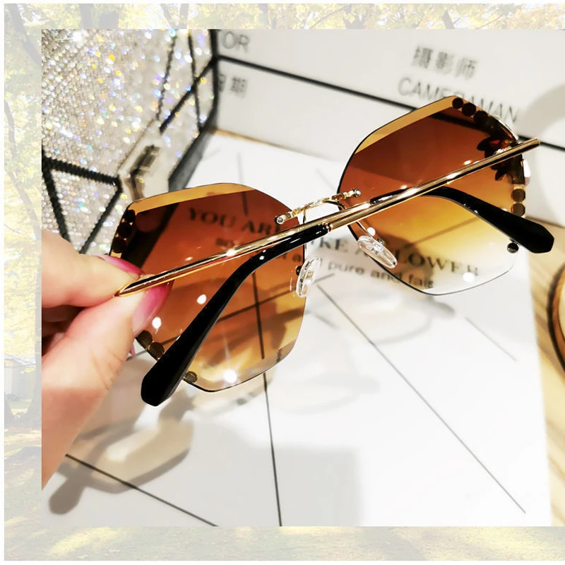 Occhiali da sole Vintage con strass senza montatura di Design di lusso donna uomo occhiali da sole con lenti sfumate di moda per donna 2024