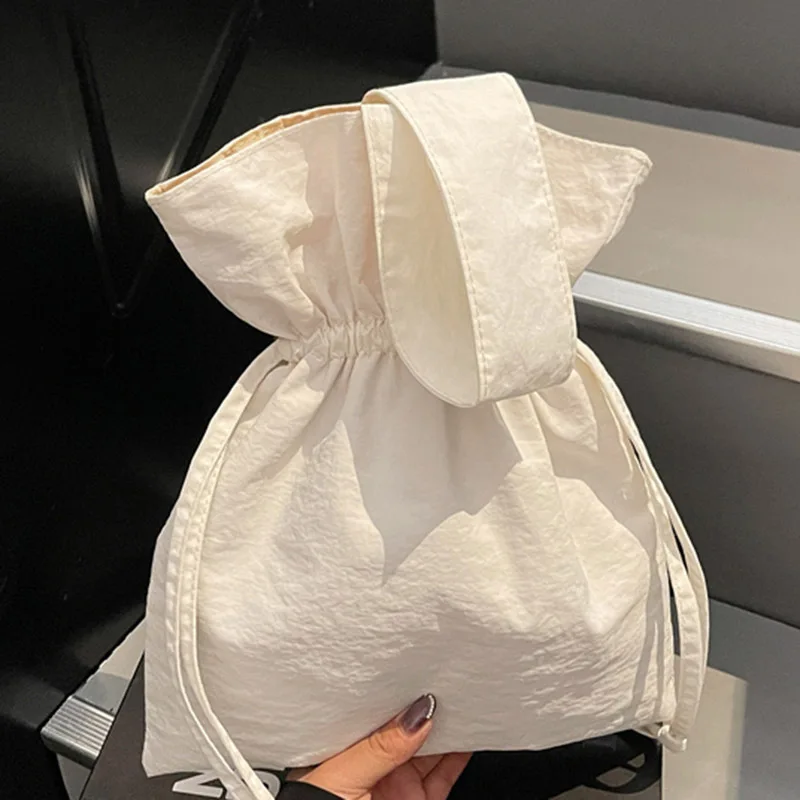 

Korean Version of Large-capacity Ins Wind Solid Color Personalized Pleated Canvas Drawstring Simple Foreign Style Shoulder Bag