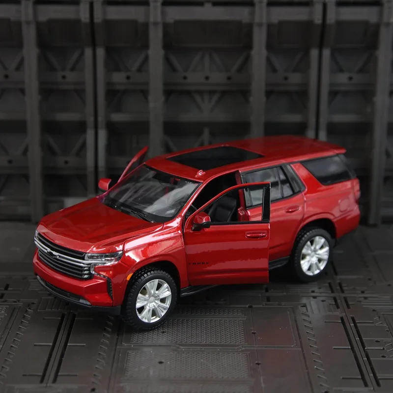 

Коллекционная модель автомобиля Tahoe 2021 в масштабе 1:26, литая под давлением, с реалистичными деталями, открывающимися дверями и выдвижным механизмом, для демонстрации и в качестве подарка