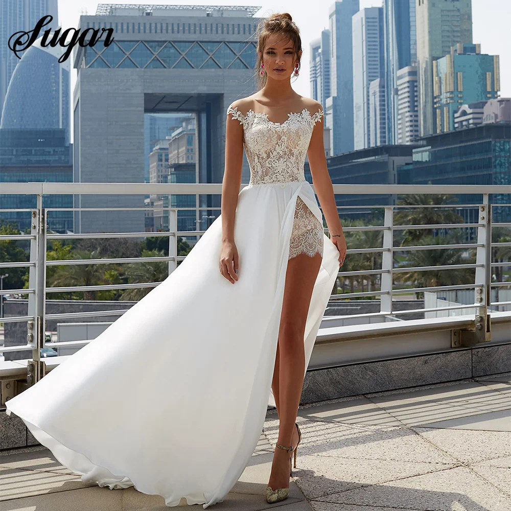 

Sexy Side High Split Wedding Dresses 2023 Sheer O-Neck Cap Sleeve Lace Appliques Chiffon A-Line Beach Bridal Gown Button Back