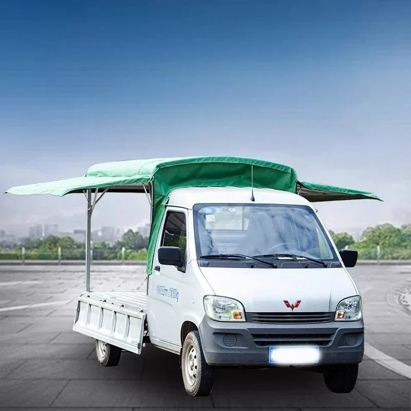 The car is adjacent to the treasure canopy, and truck cargo box carport is opened on three sides to set up canopy.