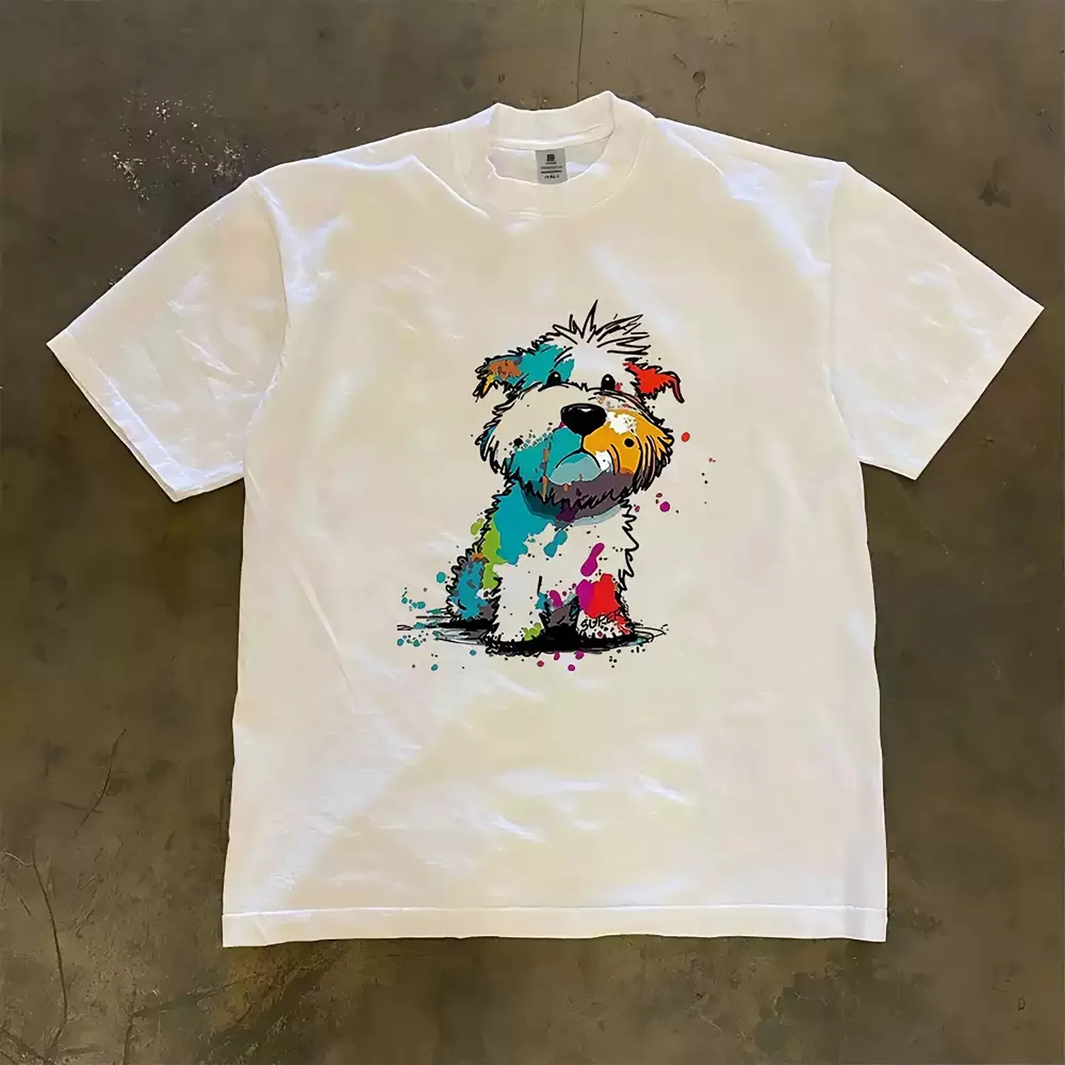 Men's Color Splash Graffiti Puppy Graphic T-Shirt, Abstract Watercolor Shaggy Dog Art Print Crew Neck Loose Casual Streetwear Soft Cotton Short Sleeve Tee.
